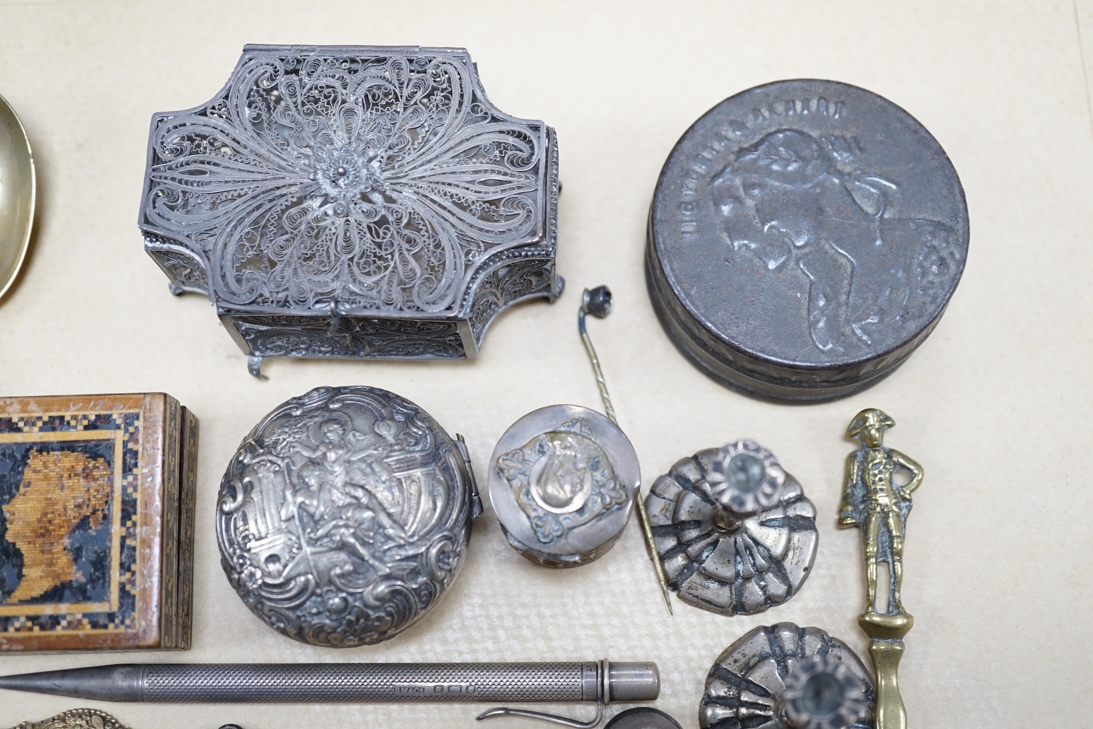 Objects of vertu and jewellery to include a carved coral stick, a pair of miniature candlesticks, a gilt metal shoe buckle, a Scottish hardstone anchor brooch and a Tunbridge ware stamp case. Condition - varies